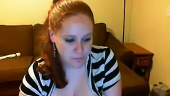 Voluptuous Redhead Engages In Self-Pleasure On Webcam