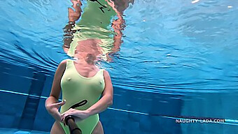 Milf Flashing In Public Pool With See-Through Swimsuit