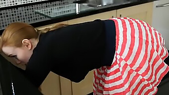 Voyeur Captures Saggy-Breasted Redhead In Downblouse Kitchen Adventure