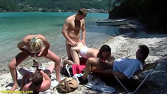 German Couple Explores Taboo Desires At Public Beach Party